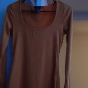 A orange long sleeve dress